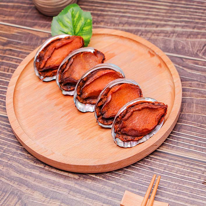 冻煮鲍鱼肉带壳，去内脏，调味，即食